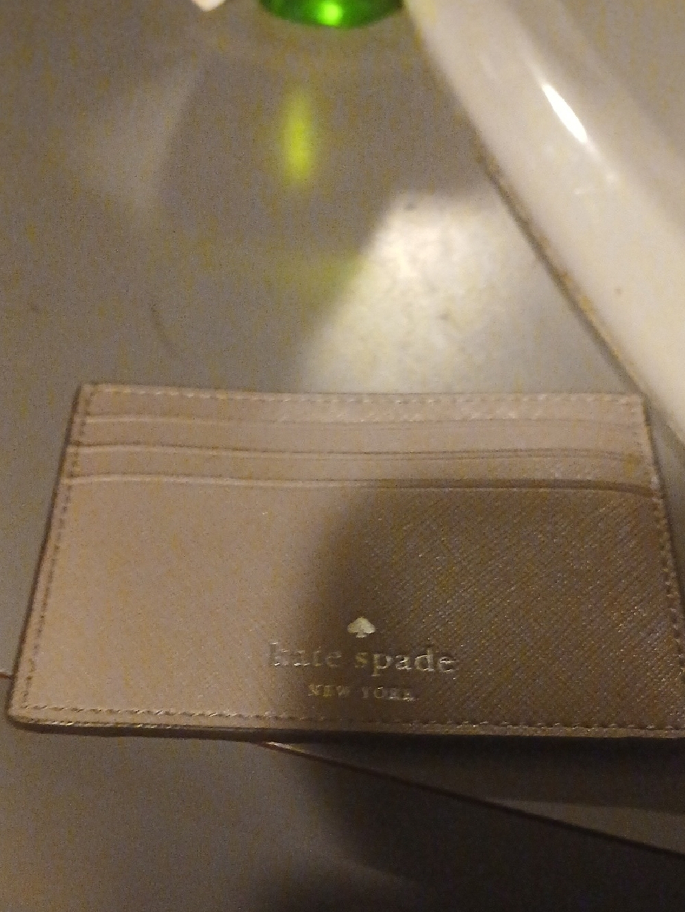 kate spade New York taupe card holder